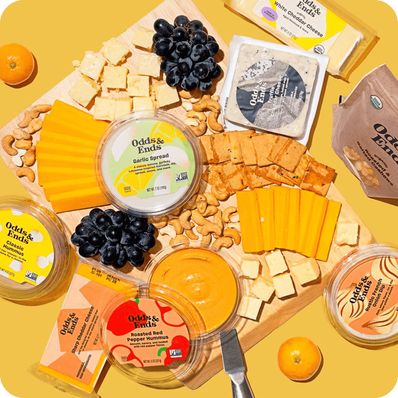 Charcuterie board with a variety of cheeses and spreads