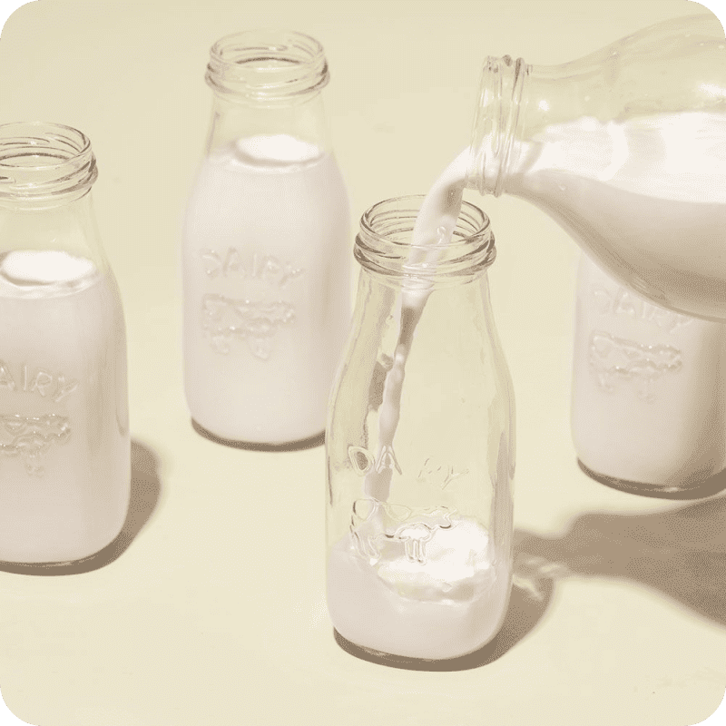 Milk being poured into glasses