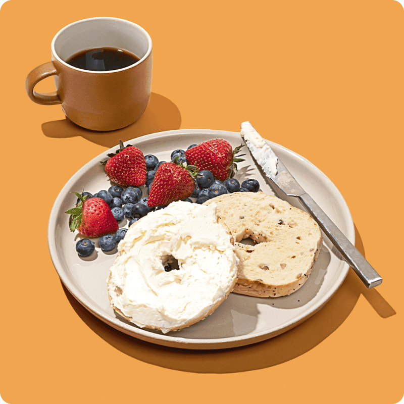 Bagel with cream cheese, fresh berries, and coffee — order bagels delivery from Misfits Market